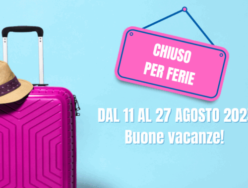 valigia e cartello siamo in ferie